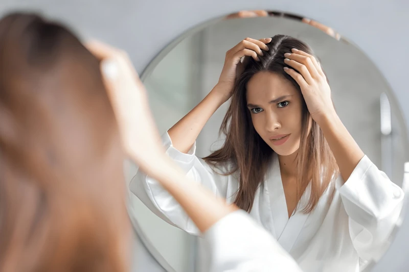 Why do the roots of hair become weak?